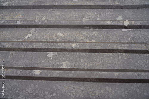 Metal roof of a house closeup with rust