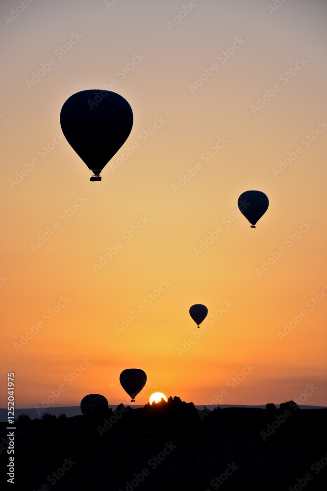 Fototapeta premium hot air balloons at sunrise at cappadocia