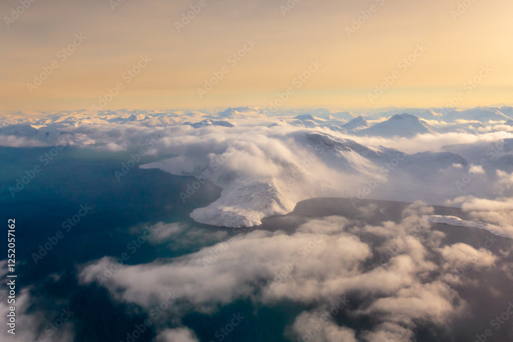 Greenlandic ice cap with frozen mountains and fjord aerial view, near Nuuk, Greenland Greenlandic ice cap with frozen mountains and fjord aerial view, near Nuuk, Greenland