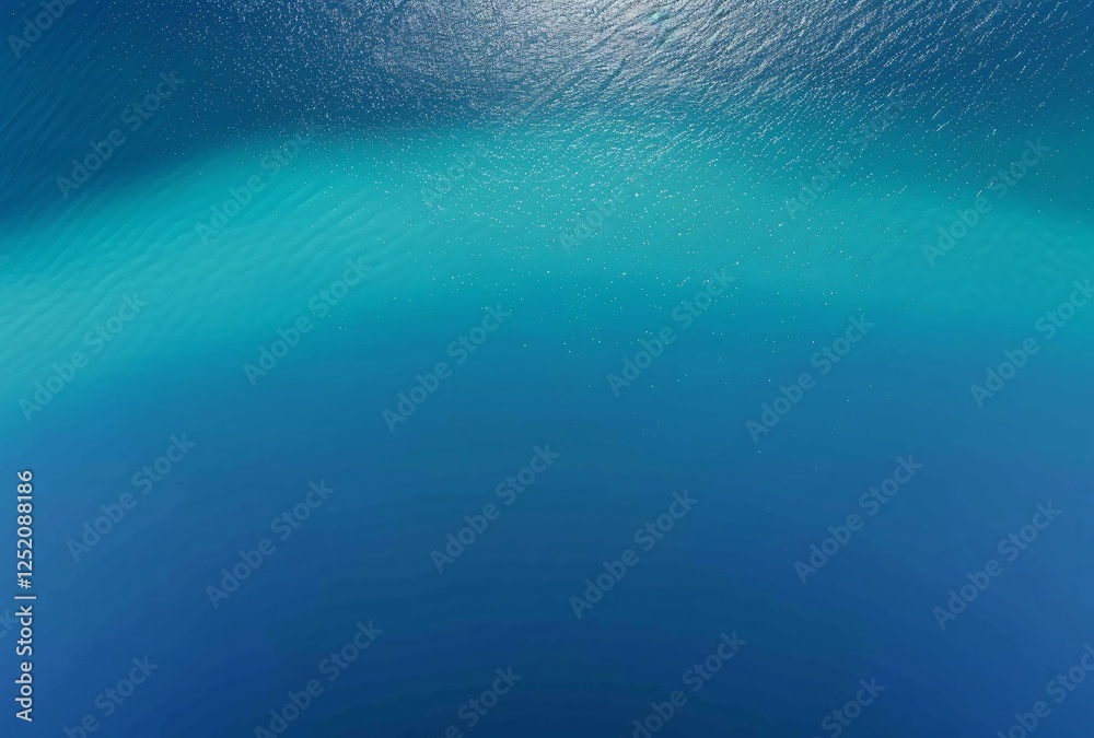 Fototapeta premium a blue water with white bubbles