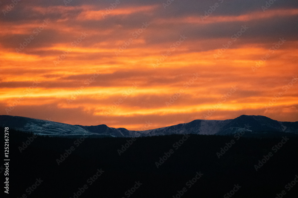 Orange Skies at Sunset Over The Rocky Mountains Orange Skies at Sunset Over The Rocky Mountains