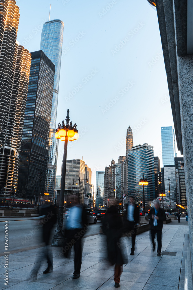 Fototapeta premium Chicago downtown, motion blur of people walking on city streets, modern skyscrapers, urban life, financial district, corporate hustle, golden hour, busy pedestrians, business district, fast-paced city
