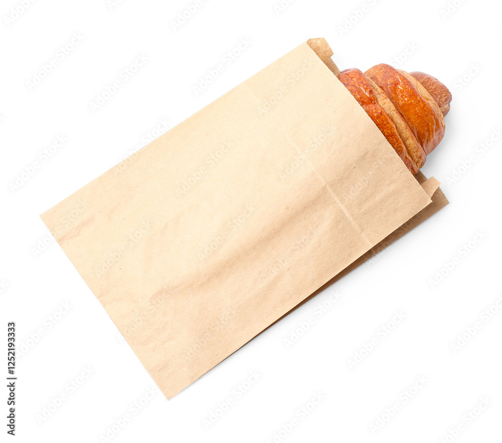 Paper bag with fresh croissant isolated on white, top view Paper bag with fresh croissant isolated on white, top view