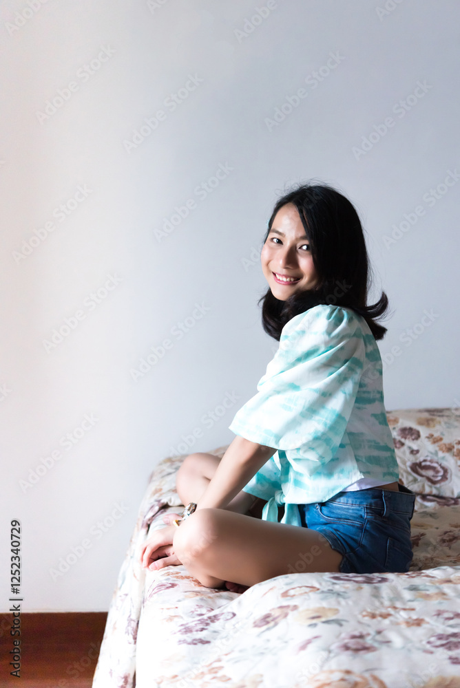Woman on bed with happiness and joyful feeling Woman on bed with happiness and joyful feeling