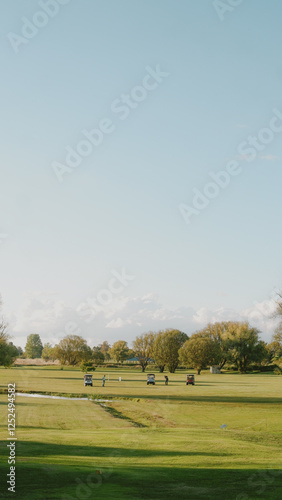 People enjoying the afternoon playing golf in Mother of Ducks, Guyra, New South Wales