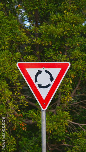 Vertical shot of a roundabout sign in Australia