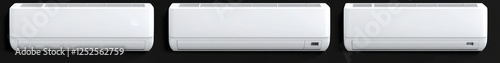Three white air conditioners on black background