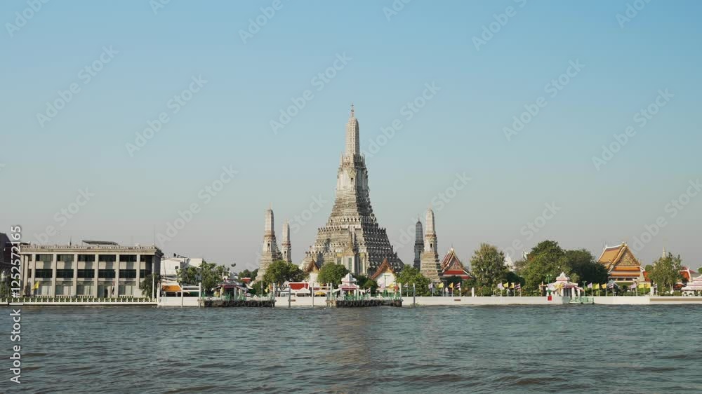 Wat Arun Buddhist temple on the bank of the Chao Phraya River early morning. Best known of Thailand's landmarks in Bangkok Wat Arun Buddhist temple on the bank of the Chao Phraya River early morning. Best known of Thailand's landmarks in Bangkok