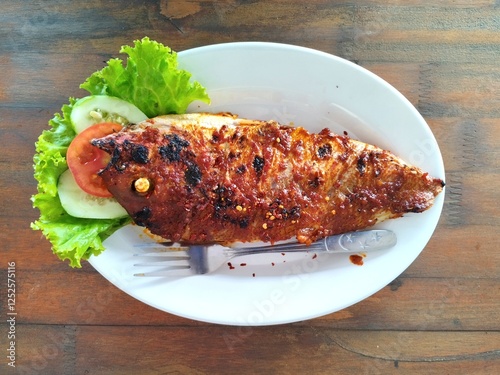 Grilled salmon steak with vegetables