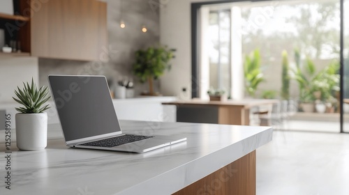 Modern Kitchen Laptop Workspace with Outdoor View photo