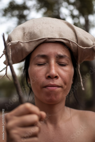 Bag headed woman looking fed up
