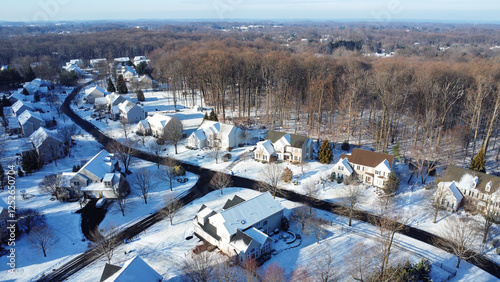 A single-family house community in Garnet Valley, Delaware county, suburb of Philadelphia, Pennsylvania after snow in winter photo