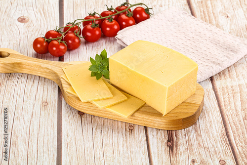 Yellow cheese piece with slices