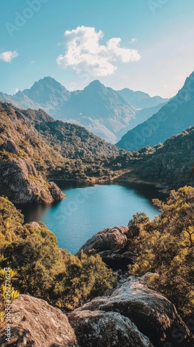 Serene mountain lake surrounded by lush greenery and rocky formations under a...