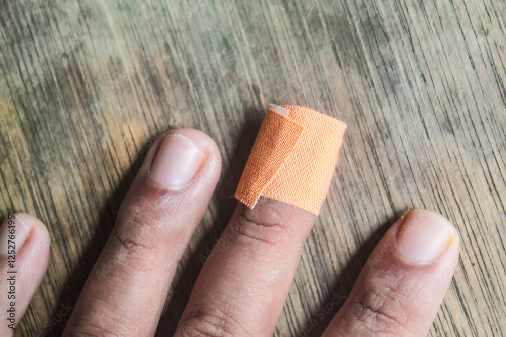 Fototapeta premium finger plastered due to wound