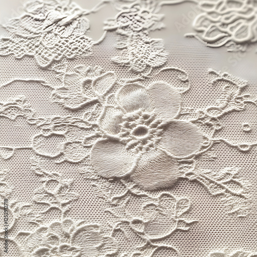 Elegance in Intricacy: A Timeless Dance of Floral Lace Patterns Showcasing Vintage Textile Artistry photo