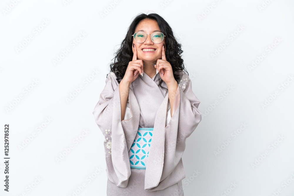 Young asian woman wearing kimono isolated on white background smiling with a happy and pleasant expression