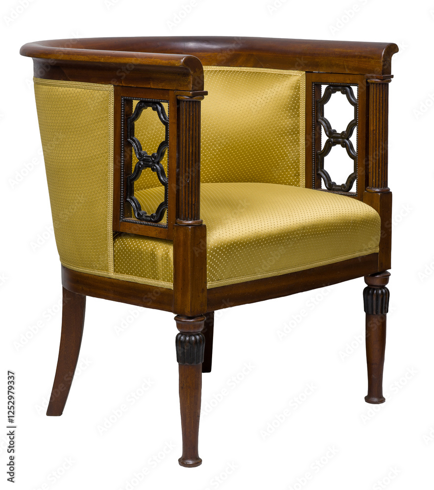 Elegant, classic armchair with a barrel back, isolated on a white background. Wooden frame with decorative details and golden yellow upholstery.