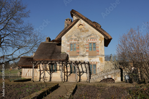 Château de Versailles domaine de Trianon hameau de la Reine Marie-Antoinette. Maisons normandes à pans de bois. photo