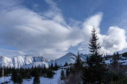 Clouds against the background of mountain peaks. Tatra Mountains. Poland.
