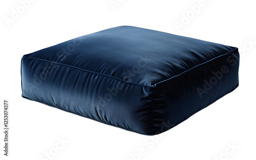 A soft velvet floor cushion in a deep blue shade on a empty plain background