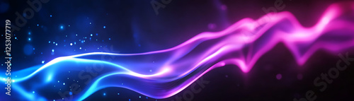 An abstract representation of colorful light waves flowing smoothly across a dark background photo