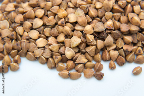 Obraz na płótnie Buckwheat, dry grains, healthy food.
w salonie