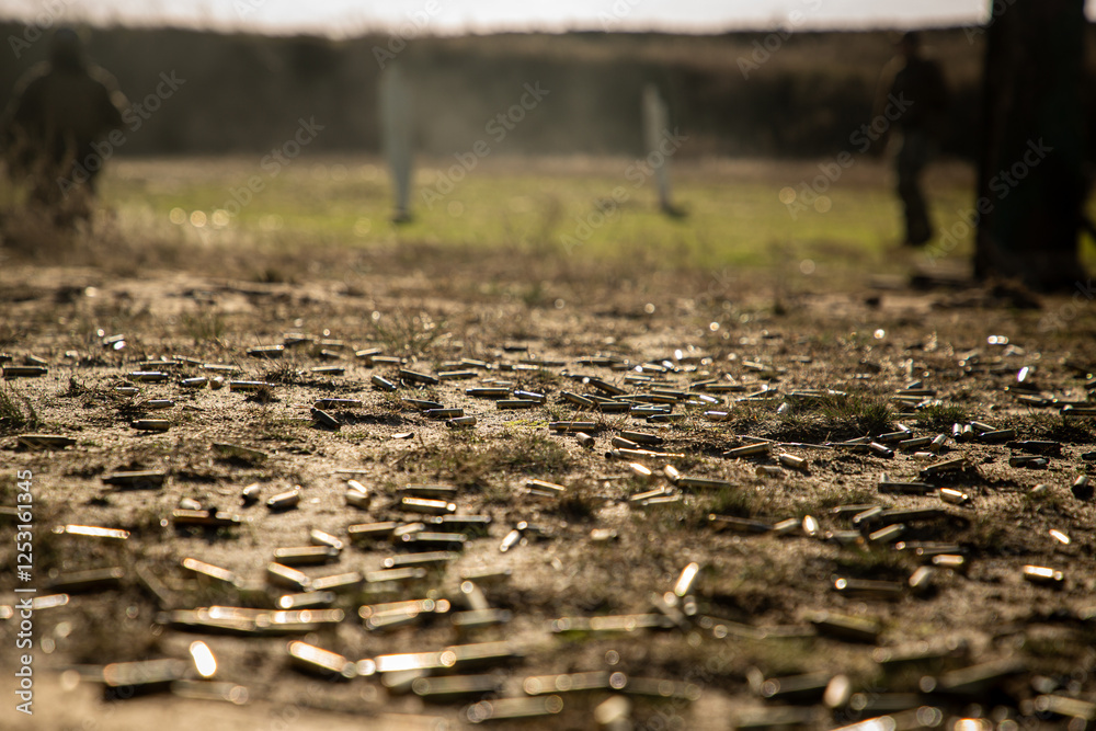 Naklejka premium ammo shells on the training field