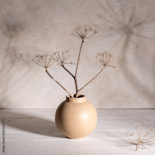 Luxury home decoration ceramic vase with flowers on sun light