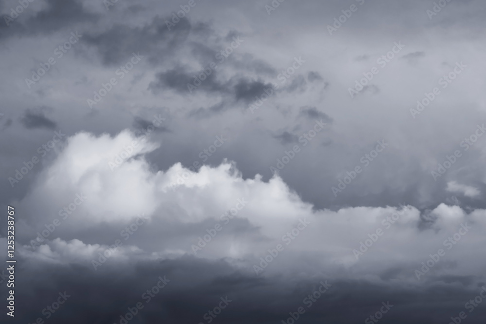 Dramatic dark storm sky background. Thunderstorm rainy cloudy. Moody weather disasters climate. Cloudscape fluffy windy day. Dramatic dark storm sky background. Thunderstorm rainy cloudy. Moody weather disasters climate. Cloudscape fluffy windy day.