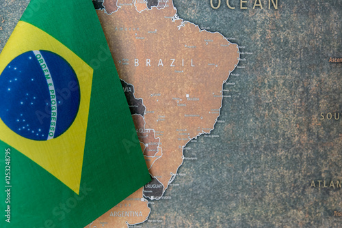 National flag of Brazil on the world map background.