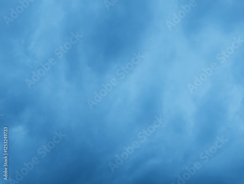 Photos Intense Blue Sky: A Stunning Cloudscape of Moody Blues and Atmospheric Depths