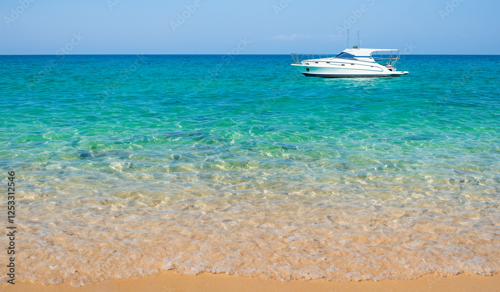 Obraz premium Summer beach aquamarine cyan blue crystal clean ocean water seascape with white yacht on the sea nature beauty lifestyle background texture website design 