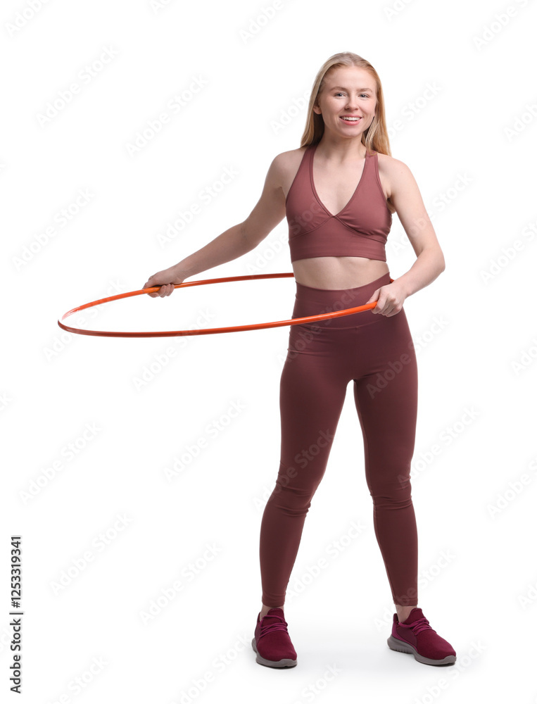 Beautiful young woman exercising with hula hoop on white background