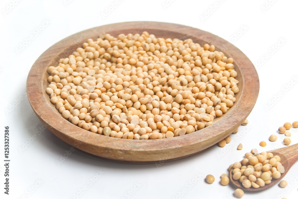 soybean seeds in wooden bowl on white background soybean seeds in wooden bowl on white background