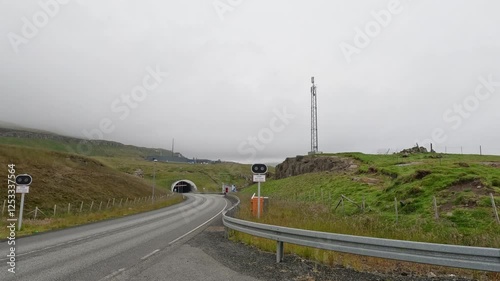 Views of the Entrance to a Tunnel Under the Sea in the Faroe Islands. The underwater tunnels connect the islands of Streymoy and Eysturoy in a network some 6.8 miles long.. photo