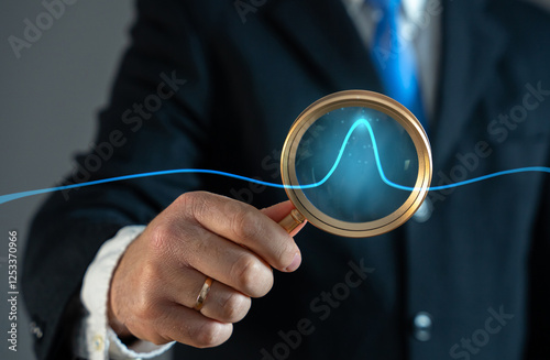 A businessman studies an abnormal jump on a chart. Sales growth. High profitability. Market demand surges, investment opportunities, stock market fluctuations. High profitability