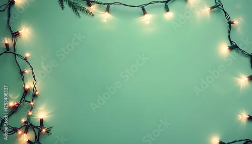 Softly glowing fairy lights on a pastel green backdrop, creating a dreamy holiday scene with copy space. photo