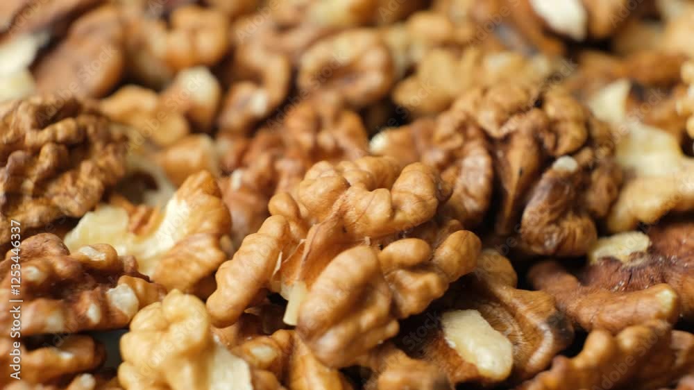 Slow spinning of raw peeled walnuts close-up. Slow spinning of raw peeled walnuts close-up.