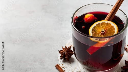 Obraz na płótnie Christmas mulled red wine or tea with spices and fruits on a white background. Traditional hot drink at Christmas time w salonie