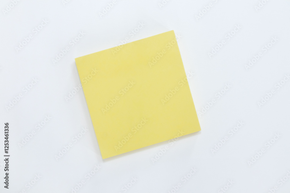 Yellow blank sticky note on white background Yellow blank sticky note on white background