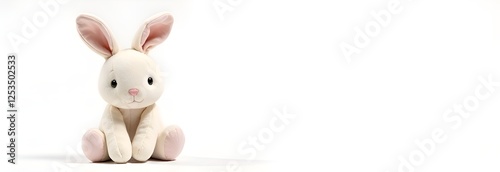 Children's card. A cute beige plush bunny sits full-face on the left side of the banner, with free space for text on the right. Background white