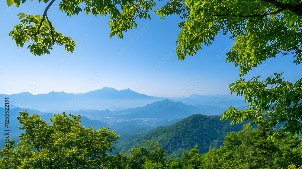Mountain range view from a peak. Forests and mountains in background create depth for travel, nature, or landscape photography Mountain range view from a peak. Forests and mountains in background create depth for travel, nature, or landscape photography