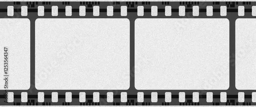 Black film strip on white background in motion