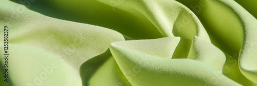 Light lime green cotton fabric with smooth texture and poplin weave for creative projects