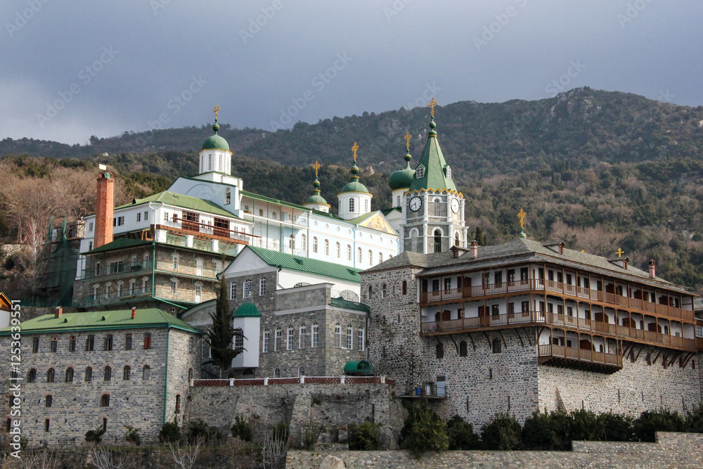 Fototapeta premium Best places to visit in Greece. Traveling and pilgrimage to the Orthodox places of Athos. Panoramic view of Russian St. Panteleimon's Orthodox monastery at Mount Athos