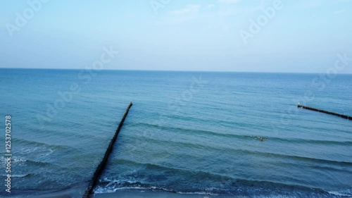 drone shot revealing the ocean
