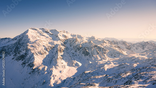 Majestic Alpine Peak Under Winter Sun (Bormio, Italy)