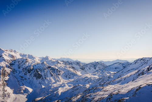 Majestic Alpine Peak Under Winter Sun (Bormio, Italy)