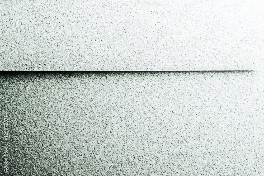 Fototapeta premium Textured surface, minimalist composition, stark contrast, clean lines, subtle gradient, abstract geometry, monochromatic palette, light and shadow play, close-up perspective, architectural detail